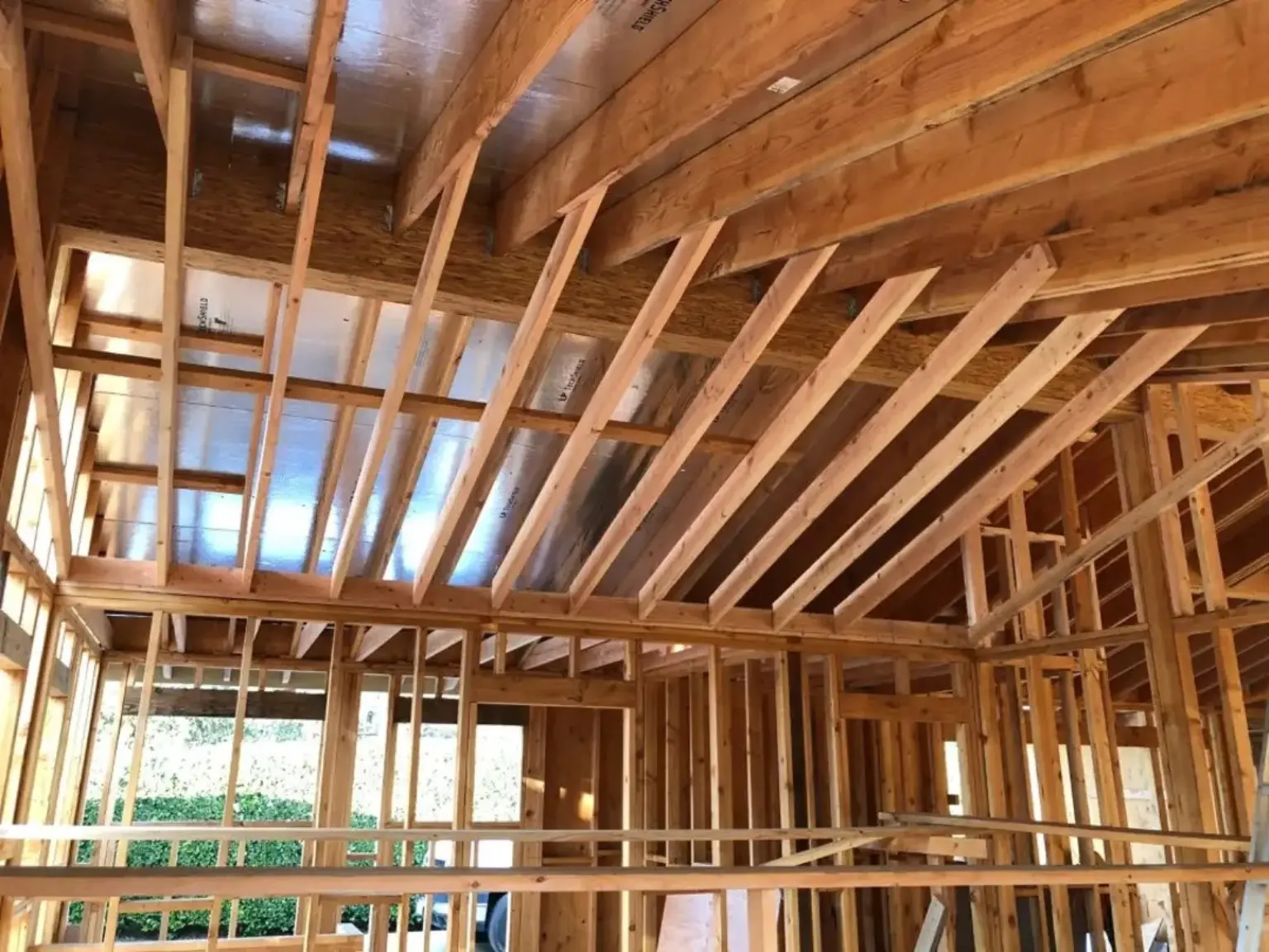 Interior roof and wall framing during JBI construction